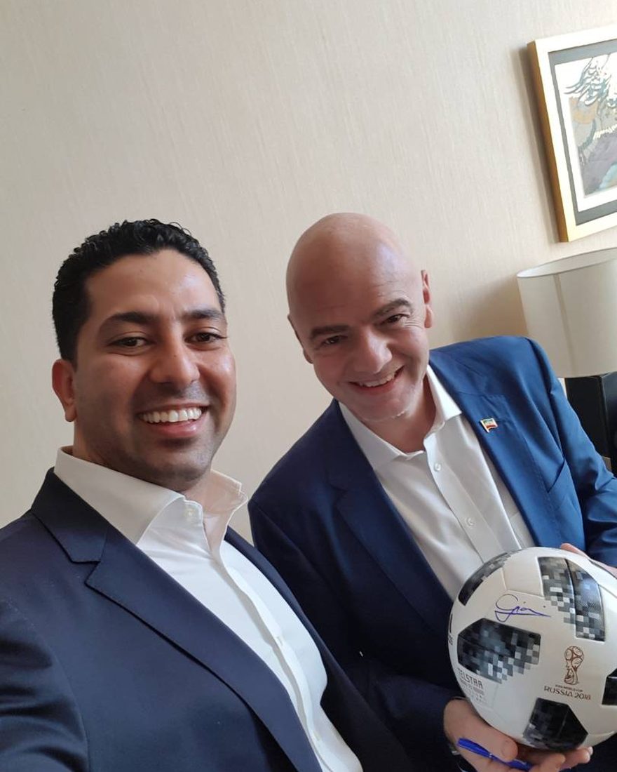 Coach Reza with a signed World Cup ball